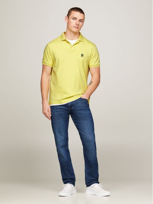 Polo de interlock con monograma TH bordado