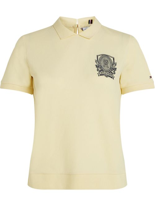 Polo con escudo TH bordado
