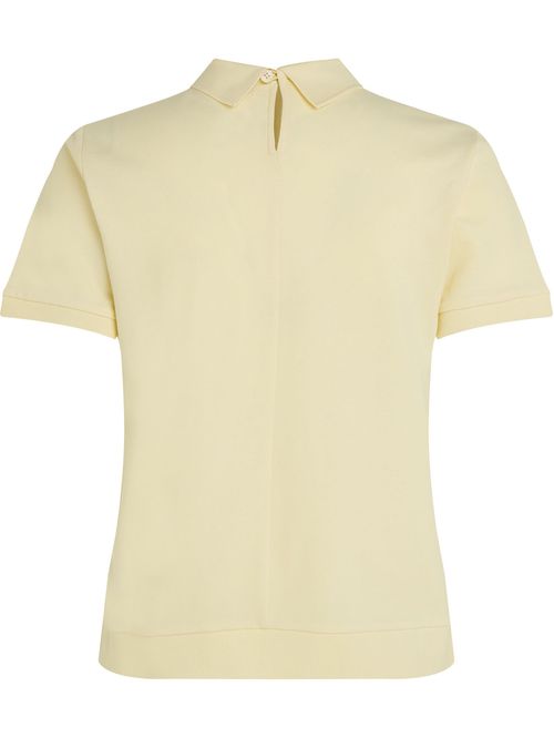 Polo con escudo TH bordado