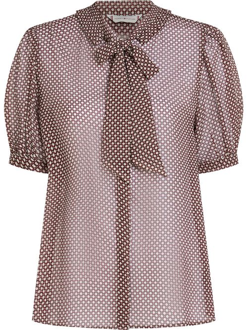 Blusa transparente con estampado y manga corta