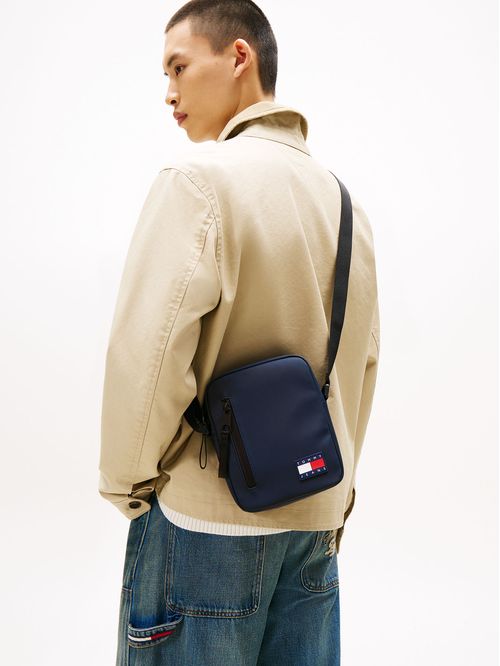 Cartera reporter con bandolera y logo