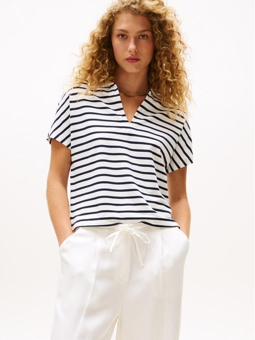 Polo de corte amplio