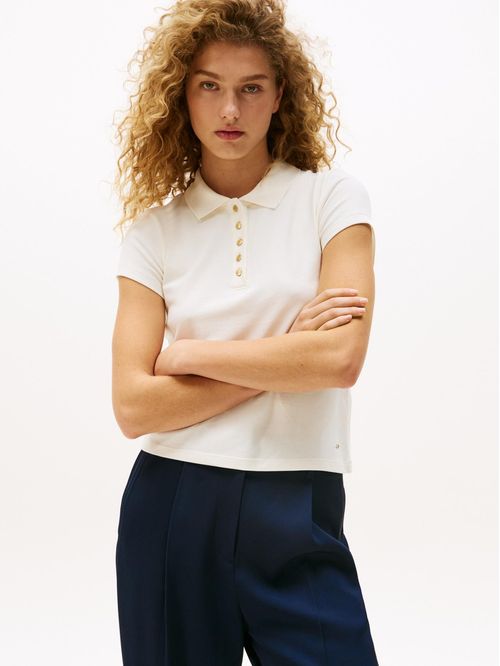 Polo de corte slim con botones dorados