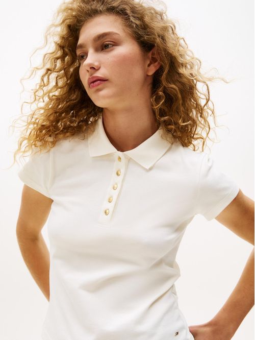 Polo de corte slim con botones dorados